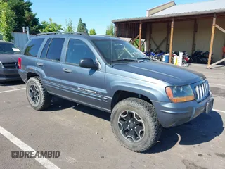 2004 Jeep Grand Cherokee Laredo z VIN 1J4GW48N14C206074, wystawiony jako IAAI lot #42627863 z przebiegiem 127 811 mil mil oraz . Historia ofert i sprzedaży dostępna na DreamBid. Obrazek 1.
