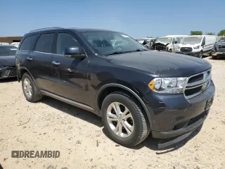 2013 Dodge Durango Crew with VIN 1C4RDJDG5DC686680, listed as a Copart auction lot 51952575 with 217,713 mi miles and Salvage Title. Bid and sale history available at carsss.com. Image 4.