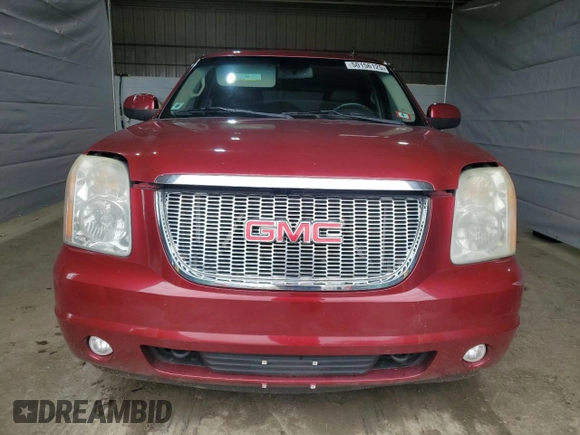 2011 GMC Yukon SLT with VIN 1GKS2CE06BR200400, listed as a Copart auction lot 50156125 with 203,008 mi miles and Salvage Title. Bid and sale history available at DreamBid. Image 5.