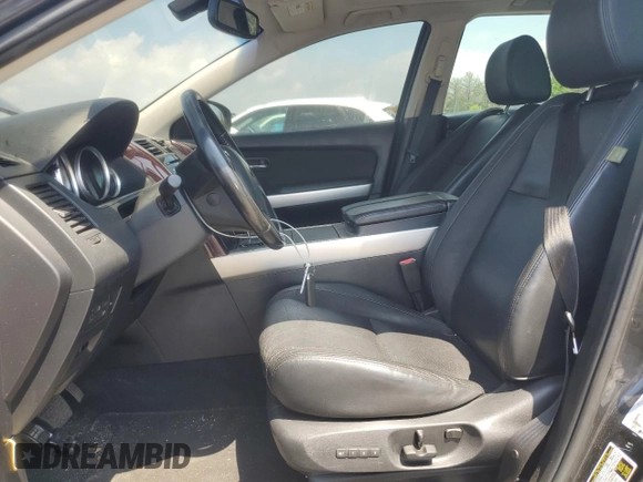 2014 Mazda CX-9 Grand Touring with VIN JM3TB3DV9E0444720, listed as a Copart auction lot 63687855 with 144,568 mi miles and Salvage title. Bid and sale history available at DreamBid. Image 7.