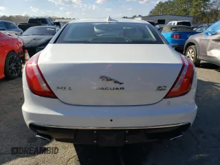 2017 Jaguar XJ with VIN SAJWJ2GD4H8W12163, listed as a Copart auction lot 86993064 with 63,697 mi miles and Salvage Title. Bid and sale history available at carsss.com. Image 6.