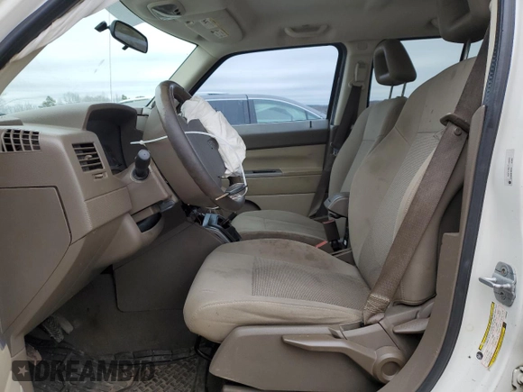 2007 Jeep Patriot Sport with VIN 1J8FT28W77D359282, listed as a Copart auction lot 44372385 with 194,152 mi miles and Salvage Title. Bid and sale history available at DreamBid. Image 7.