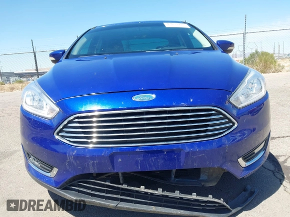 2015 Ford Focus Titanium with VIN 1FADP3J25FL314903, listed as a IAAI auction lot 42053132 with 125,418 mi miles and . Bid and sale history available at carsss.com. Image 13.
