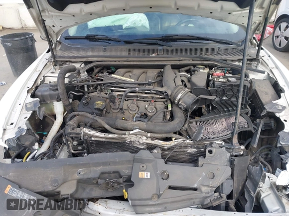 2013 Ford Taurus SEL with VIN 1FAHP2E81DG121759, listed as a IAAI auction lot 41939931 with 110,756 mi miles. Bid and sale history available at carsss.com. Image 10.