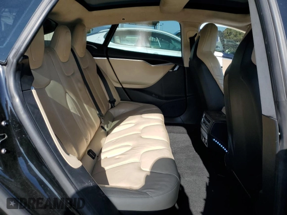 2016 Tesla Model S 90D with VIN 5YJSA1E20GF169954, listed as a Copart auction lot 61974475 with 124,560 mi miles and Salvage title. Bid and sale history available at DreamBid. Image 10.
