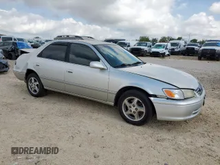 2000 Toyota Camry CE с VIN JT2BG22KXY0391368, выставлен на аукционе Copart как лот 59923575 с пробегом 220 660 миль миль и Списание • Salvage title. История ставок и продаж доступна на DreamBid. Изображение 4.