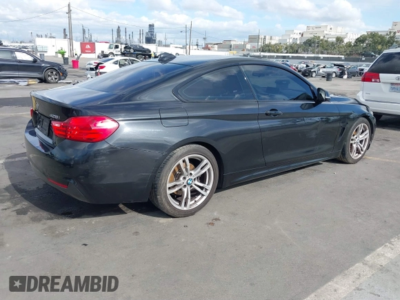 2014 BMW 4 Series 428i with VIN WBA3N7C55EF719504, listed as a IAAI auction lot 41403957 with 98,882 mi miles and . Bid and sale history available at carsss.com. Image 4.