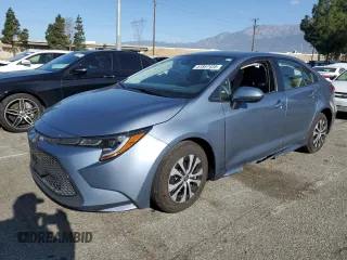 2022 Toyota Corolla Hybrid LE with VIN JTDEAMDEXN3006927, listed as a Copart auction lot 51857435 with 25,447 mi miles and Salvage Title. Bid and sale history available at carsss.com. Image 1.