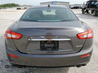 2017 Maserati Ghibli z VIN ZAM57XSA9H1206127, wystawiony jako Copart lot #56883775 z przebiegiem 13 439 mil mil oraz Czysty tytuł • Clean title. Historia ofert i sprzedaży dostępna na DreamBid. Obrazek 6.