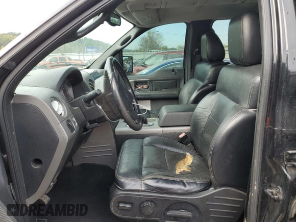 2004 Ford F-150 XLT with VIN 1FTPW145X4KC95658, listed as a Copart auction lot 71197604 with 219,018 mi miles and Salvage Title. Bid and sale history available at carsss.com. Image 7.