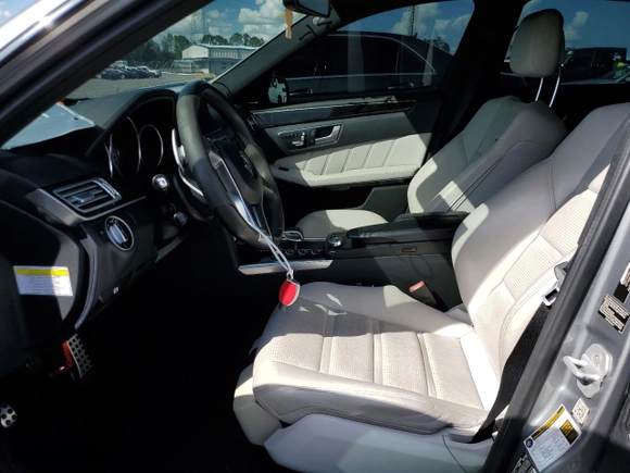 2014 Mercedes-Benz E-Class E 63 AMG S-Model with VIN WDDHF7GB7EA910740, listed as a Copart auction lot 73857184 with 115,493 mi miles and Salvage Title. Bid and sale history available at carsss.com. Image 7.