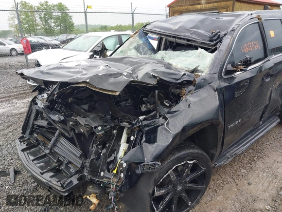 2018 Chevrolet Tahoe LT with VIN 1GNSCBKC2JR359681, listed as a IAAI auction lot 42287525 with 144,568 mi miles and . Bid and sale history available at DreamBid. Image 6.