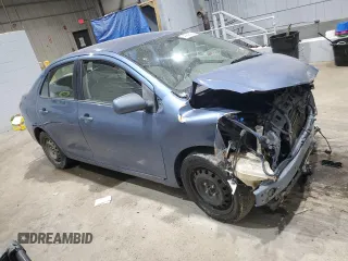 2009 Toyota Yaris with VIN JTDBT903094047243, listed as a Copart auction lot 47296455 with 235,483 mi miles and Salvage Title. Bid and sale history available at DreamBid. Image 4.