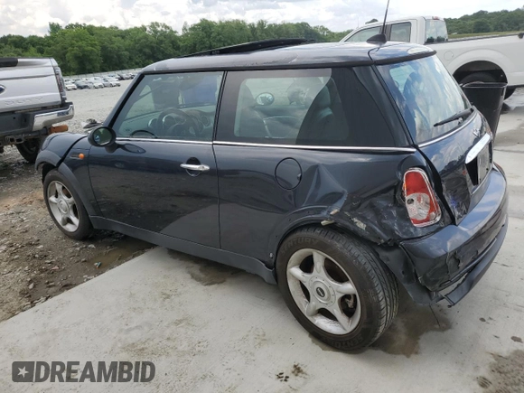 2005 MINI Hardtop with VIN WMWRC33595TJ72148, listed as a Copart auction lot 54310325 with 189,243 mi miles and Salvage title. Bid and sale history available at DreamBid. Image 2.