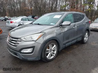 2013 Hyundai Santa Fe 2.0T Sport with VIN 5XYZWDLA3DG050022, listed as a IAAI auction lot 41957421 with 196,348 mi miles. Bid and sale history available at carsss.com. Image 2.