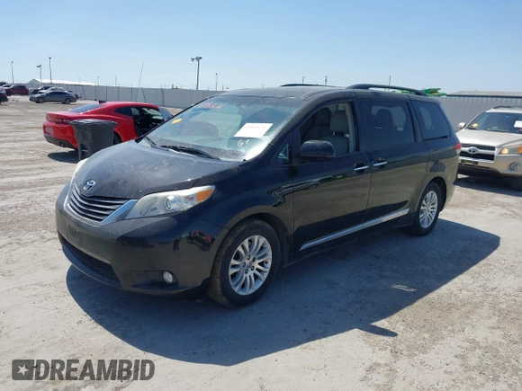 2013 Toyota Sienna XLE AAS z VIN 5TDYK3DC6DS340954, wystawiony jako IAAI lot #41883676 z przebiegiem 190 812 mil mil oraz . Historia ofert i sprzedaży dostępna na DreamBid. Obrazek 14.