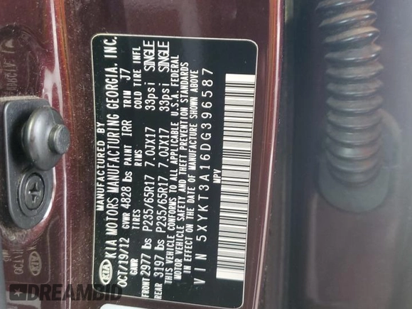 2013 Kia Sorento LX with VIN 5XYKT3A16DG396587, listed as a Copart auction lot 54019075 with 80,051 mi miles and Salvage title. Bid and sale history available at DreamBid. Image 14.
