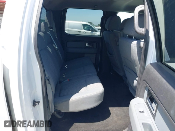 2014 Ford F-150 XL with VIN 1FTFW1CT0EKF76199, listed as a IAAI auction lot 42408498 with 103,695 mi miles and . Bid and sale history available at DreamBid. Image 8.