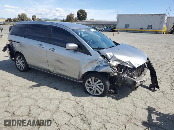 2012 Mazda 5 Sport with VIN JM1CW2BL6C0115401, listed as a Copart auction lot 57275225 with 144,311 mi miles and Non repairable. Bid and sale history available at DreamBid. Image 4.