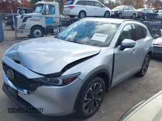 2023 Mazda CX-5 2.5 S Premium Package with VIN JM3KFBDM6P0158294, listed as a IAAI auction lot 40662093 with 15,841 mi miles. Bid and sale history available at carsss.com. Image 2.