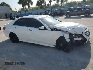 2014 Mercedes-Benz E 350 Sport with VIN WDDHF5KB5EA967675, listed as a Copart auction lot 52763995 with 68,902 mi miles and Salvage title. Bid and sale history available at DreamBid. Image 4.