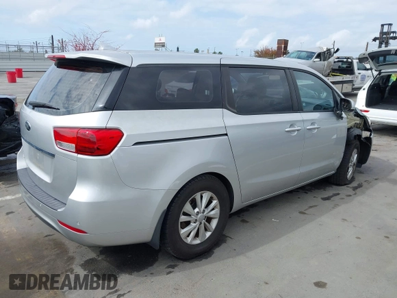 2015 Kia Sedona L with VIN KNDMA5C16F6027418, listed as a IAAI auction lot 42129259 with 78,097 mi miles. Bid and sale history available at carsss.com. Image 4.