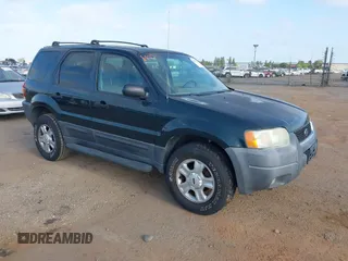 2003 Ford Escape XLT Popular 2 with VIN 1FMYU93113KE18944, listed as a IAAI auction lot 42056372 with 244,942 mi miles. Bid and sale history available at carsss.com. Image 1.