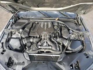 2018 BMW M5 z VIN WBSJF0C56JB282184, wystawiony jako Copart lot #87480414 z przebiegiem Nie podano mil oraz Szkody całkowita. Historia ofert i sprzedaży dostępna na DreamBid. Obrazek 11.