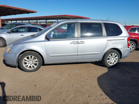2008 Kia Sedona with VIN KNDMB133686227144, listed as a IAAI auction lot 41868692 with 124,269 mi miles. Bid and sale history available at carsss.com. Image 14.