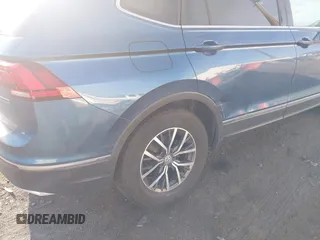2020 Volkswagen Tiguan SE with VIN 3VV2B7AX2LM017277, listed as a IAAI auction lot 42075052 with 72,248 mi miles and . Bid and sale history available at DreamBid. Image 6.