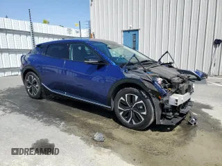 2024 Kia EV6 Wind with VIN KNDC34LA4R5205661, listed as a Copart auction lot 54445665 with 36,594 mi miles and Clean Title. Bid and sale history available at DreamBid. Image 4.