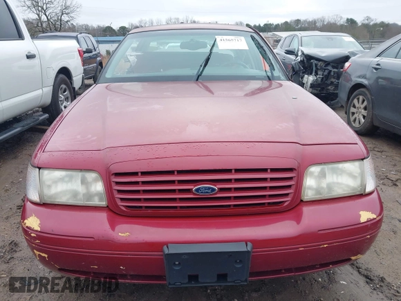 2002 Ford Crown Victoria LX z VIN 2FAFP74W82X148324, wystawiony jako IAAI lot #41565717 z przebiegiem 114 536 mil mil oraz . Historia ofert i sprzedaży dostępna na DreamBid. Obrazek 12.