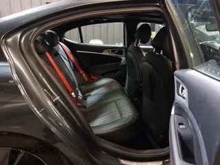 2023 Genesis G70 2.0T with VIN KMTG34TA3PU115553, listed as a IAAI auction lot 41822917 with 35,784 mi miles and . Bid and sale history available at DreamBid. Image 8.