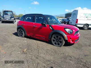 2015 MINI Countryman S z VIN WMWZC3C52FWT05204, wystawiony jako IAAI lot #41492775 z przebiegiem 80 785 mil mil oraz . Historia ofert i sprzedaży dostępna na DreamBid. Obrazek 1.
