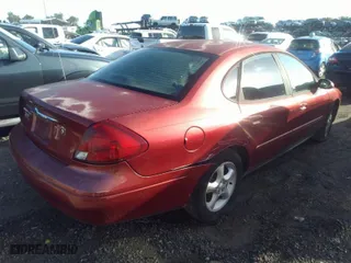 2001 Ford Taurus SES with VIN 1FAFP55U41A281039, listed as a IAAI auction lot 41676971 with 139,866 mi miles. Bid and sale history available at carsss.com. Image 4.