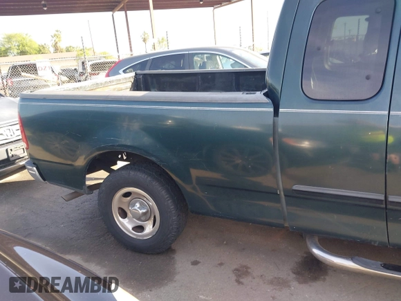 2002 Ford F-150 XL with VIN 1FTRX17L42NA52360, listed as a IAAI auction lot 41886697 with 121,346 mi miles. Bid and sale history available at carsss.com. Image 12.