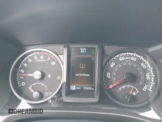 2021 Toyota Tacoma SR with VIN 5TFAX5GN7MX192500, listed as a IAAI auction lot 41674939 with 33,608 mi miles and . Bid and sale history available at DreamBid. Image 7.