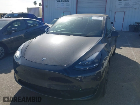 2025 Tesla Model Y Long Range with VIN 7SAYGDED2SF228414, listed as a IAAI auction lot 41706470 with 11,319 mi miles and . Bid and sale history available at DreamBid. Image 19.