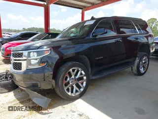 2019 Chevrolet Tahoe LT z VIN 1GNSKBKCXKR361392, wystawiony jako IAAI lot #42661332 z przebiegiem 112 973 mil mil oraz . Historia ofert i sprzedaży dostępna na DreamBid. Obrazek 2.
