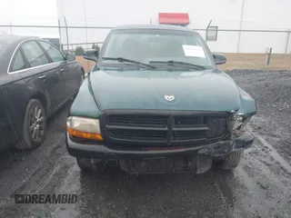 1999 Dodge Dakota SLT with VIN 1B7FL26XXXS209424, listed as a IAAI auction lot 41264544 with 70,523 mi miles. Bid and sale history available at carsss.com. Image 17.
