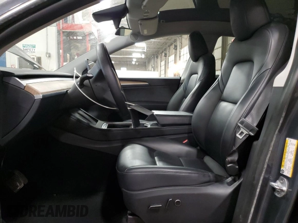 2023 Tesla Model Y Long Range with VIN 7SAYGDEE8PA034239, listed as a Copart auction lot 46429785 with 66,944 mi miles and Non Repairable. Bid and sale history available at DreamBid. Image 7.