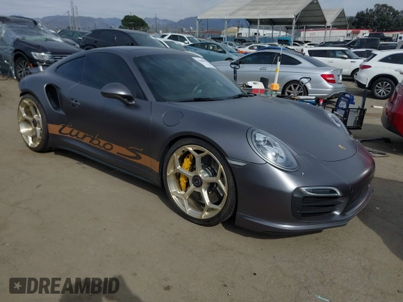 2015 Porsche 911 Turbo S with VIN WP0AD2A92FS166616, listed as a IAAI auction lot 41688055 with 38,345 mi miles. Bid and sale history available at carsss.com. Image 1.