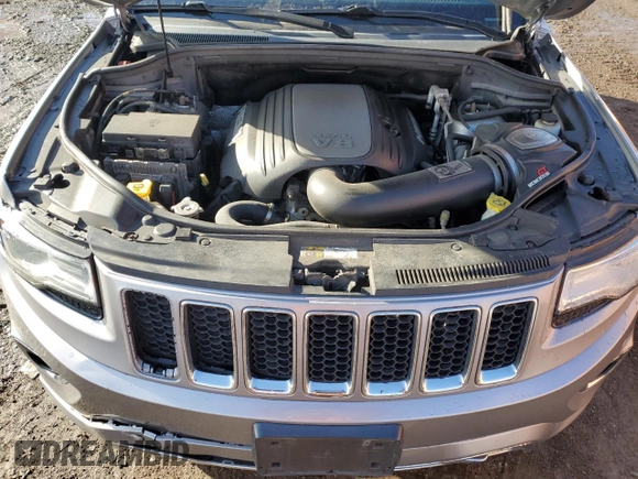 2015 Jeep Grand Cherokee Overland with VIN 1C4RJFCT8FC619014, listed as a Copart auction lot 44304375 with 123,767 mi miles and Salvage Title. Bid and sale history available at carsss.com. Image 13.