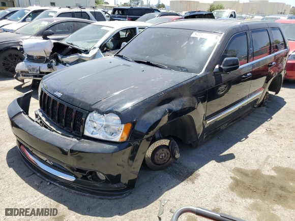 2007 Jeep Grand Cherokee SRT-8 with VIN 1J8HR78387C603473, listed as a Copart auction lot 57712964 with 114,429 mi miles and Salvage Title. Bid and sale history available at carsss.com. Image 1.