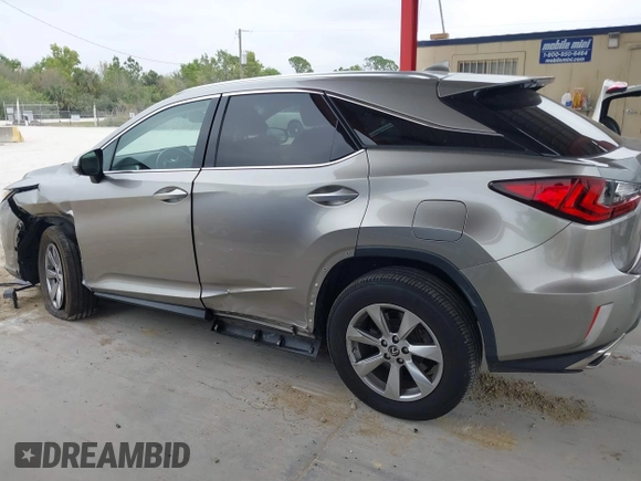 2018 Lexus RX 350 z VIN 2T2BZMCA3JC151296, wystawiony jako IAAI lot #41331203 z przebiegiem 73 051 mil mil oraz . Historia ofert i sprzedaży dostępna na DreamBid. Obrazek 14.