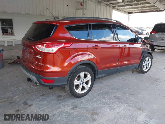 2016 Ford Escape SE with VIN 1FMCU0GX1GUB12017, listed as a IAAI auction lot 40760172 with 174,572 mi miles. Bid and sale history available at carsss.com. Image 4.