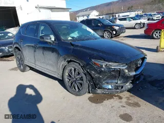 2017 Mazda CX-5 Grand Touring with VIN JM3KFBDL9H0202653, listed as a IAAI auction lot 41415573 with 54,949 mi miles. Bid and sale history available at carsss.com. Image 1.