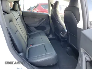 2024 Tesla Model Y Long Range with VIN 7SAYGDEEXRA288960, listed as a Copart auction lot 60801525 with 18,942 mi miles and Salvage title. Bid and sale history available at DreamBid. Image 11.