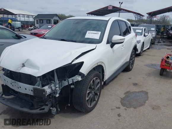 2016 Mazda CX-5 Grand Touring with VIN JM3KE4DY6G0618121, listed as a IAAI auction lot 41958805 with 101,232 mi miles. Bid and sale history available at carsss.com. Image 18.
