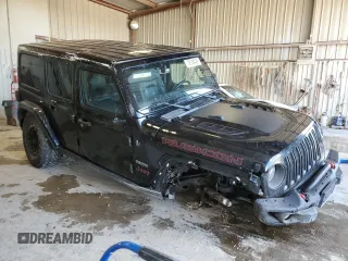2020 Jeep Wrangler Unlimited Recon with VIN 1C4HJXFN0LW263201, listed as a Copart auction lot 79129424 with 73,405 mi miles and Salvage title. Bid and sale history available at DreamBid. Image 4.
